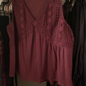 Maurice’s maroon top